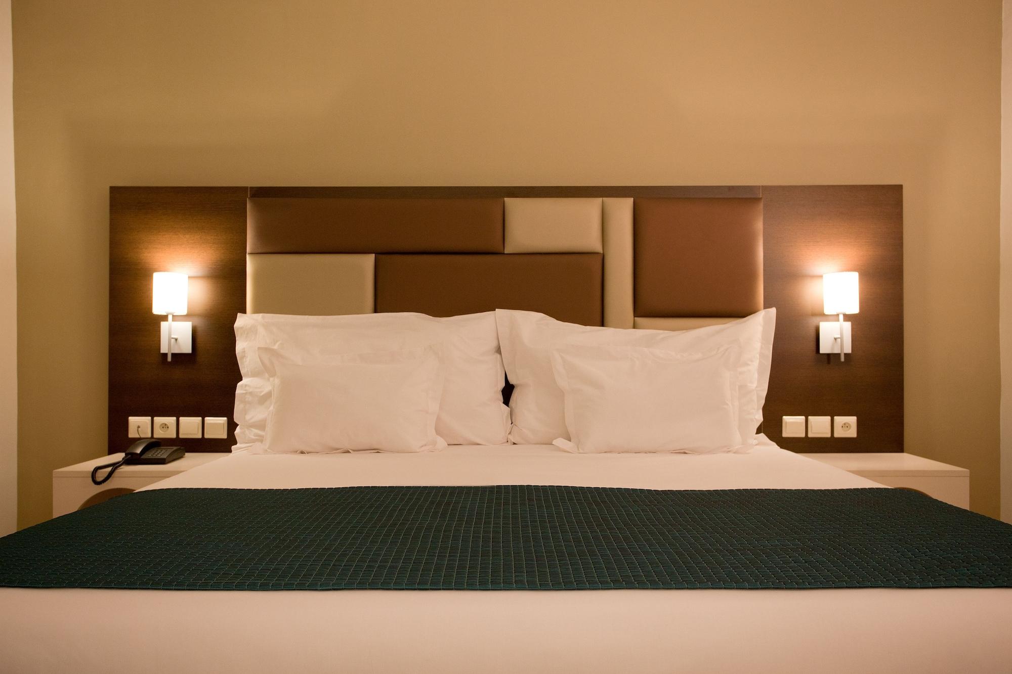 Hotel Kenzi Europa Agadir Exterior foto A bed with a headboard