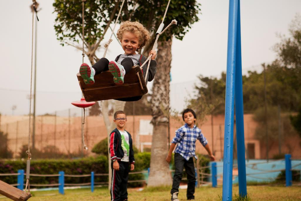 Hotel Kenzi Europa Agadir Exterior foto Children playing on a swing